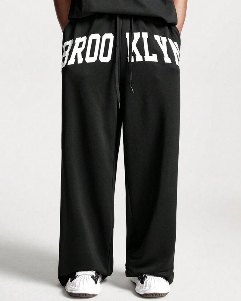 FLYNOFF Brooklyn Print Black Loose Fit Track Pant - Image 1